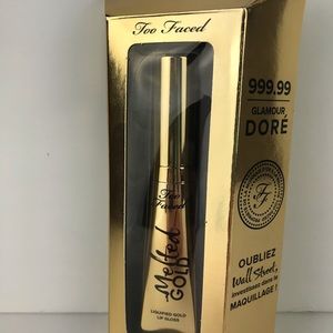 Too Faced Melted Gold Lio Gloss in “Melted Gold”
